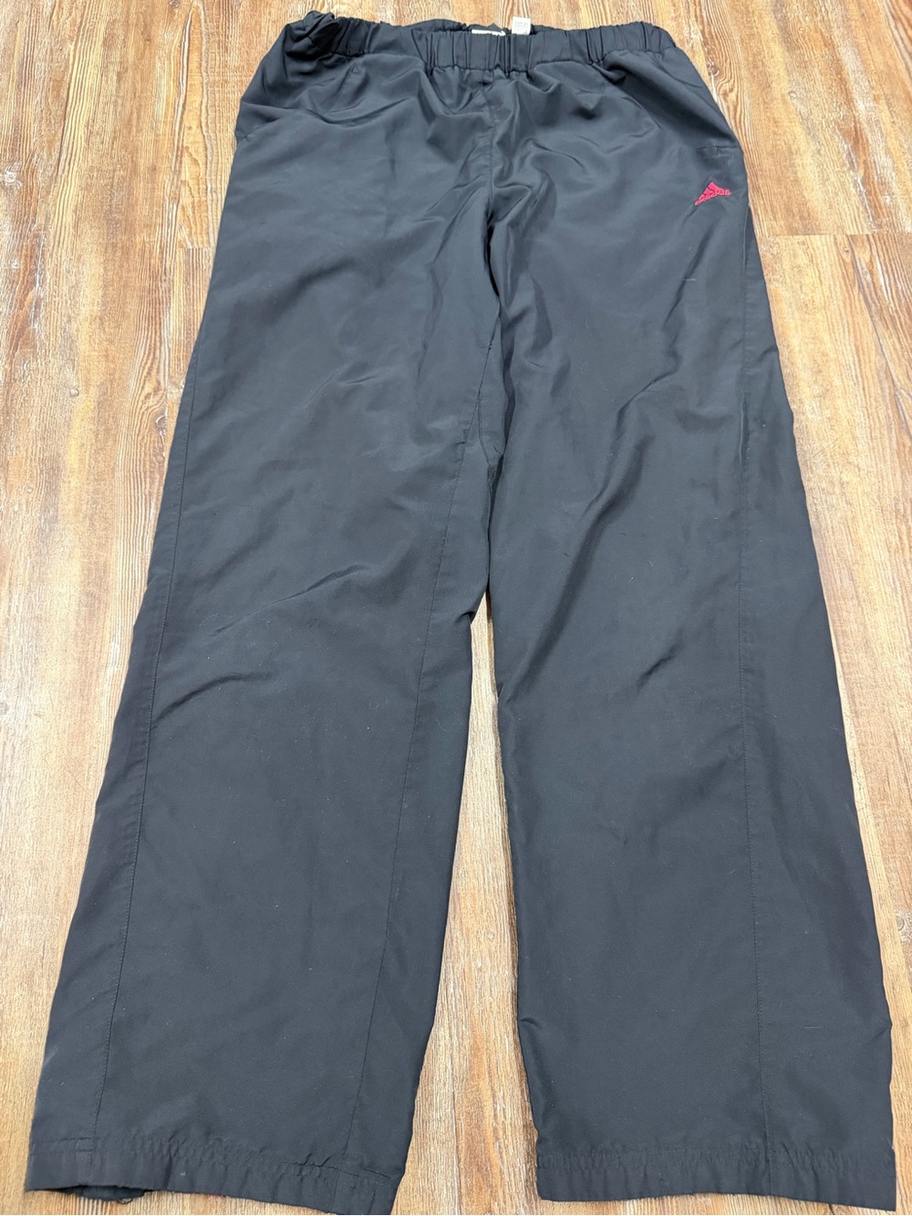 Y2K Adidas black track pants with hot pink logo and stripes on back legs, size M